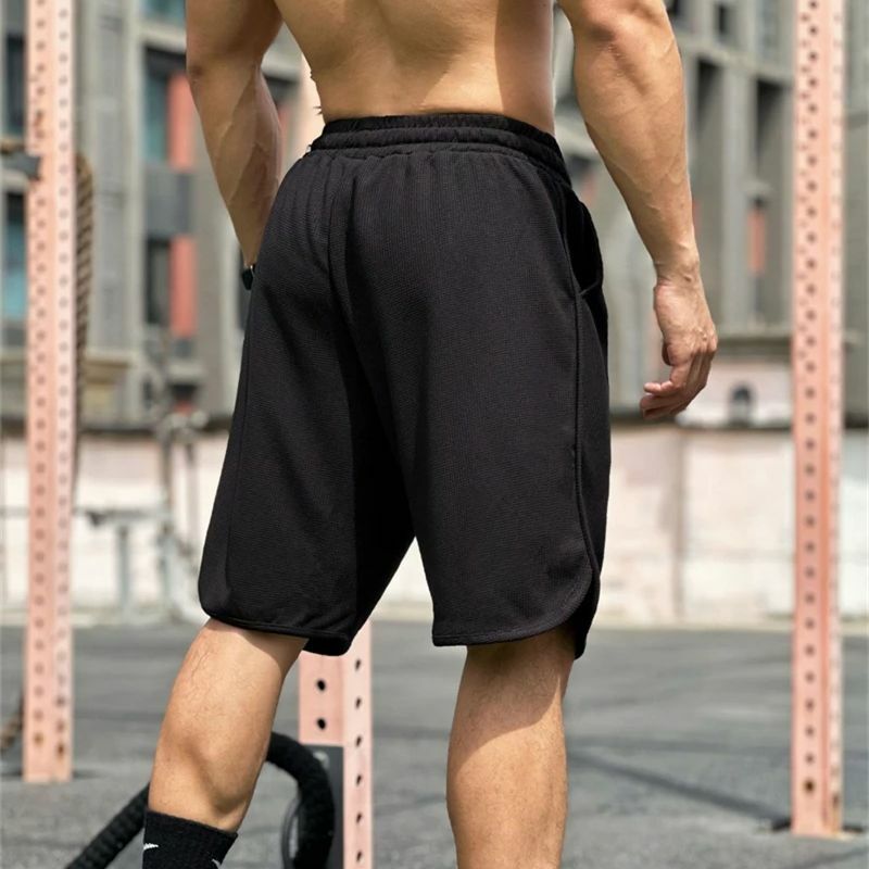 Pantalones cortos informales de secado rápido para hombre, shorts sueltos de fitness, color sólido, a la moda, Verano