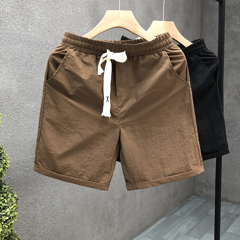 2024 Męskie letnie nowe szorty ze sznurkiem i luźnymi kieszeniami Męskie szorty plażowe w jednolitym kolorze Męskie cienkie proste krótkie spodnie codzienne G58