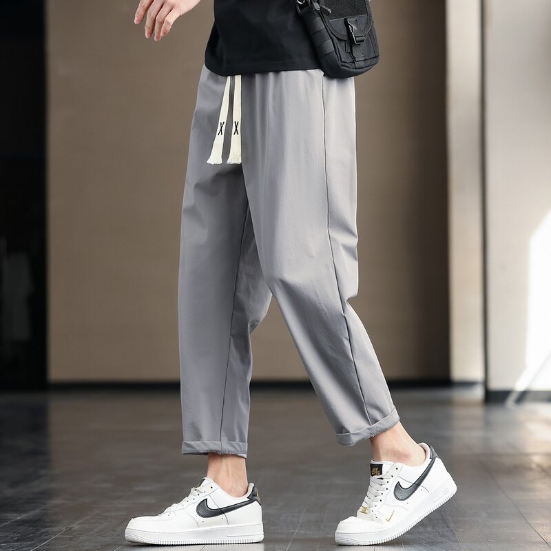 2024 New Spring/Summer Simple Solid Color Men's Elastic Waist Drawstring Pockets Casual Ice Silk Fabric Loose Ankle Length Pants