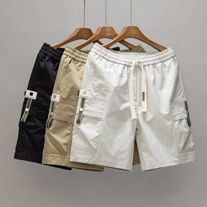 Celana pendek kasual pria, M-5XL kolor warna polos saku besar untuk kerja bagian tipis longgar musim panas