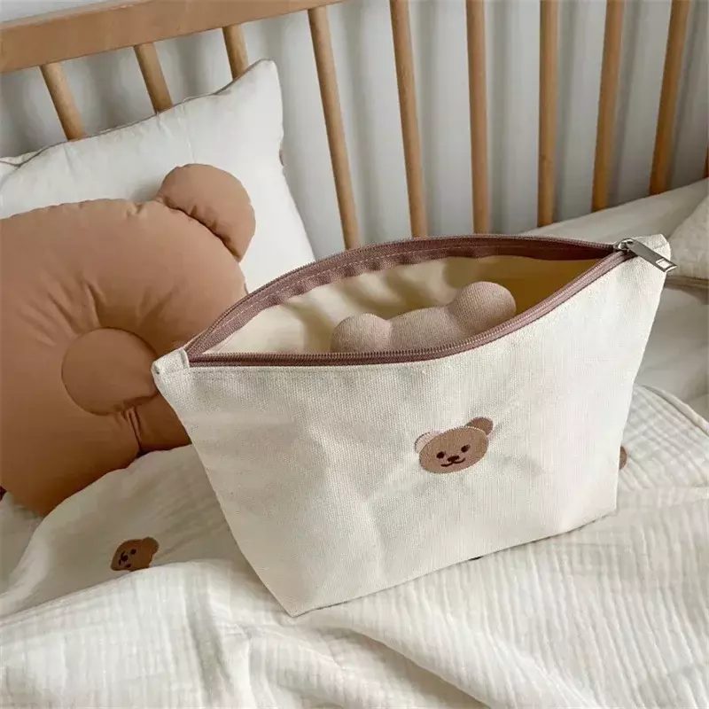 Bolsa de pañales de moda coreana para recién nacido, bolsa de almacenamiento de pañales de animales de dibujos animados simples, bolsa de almacenamiento multifuncional Kawaii para mujer