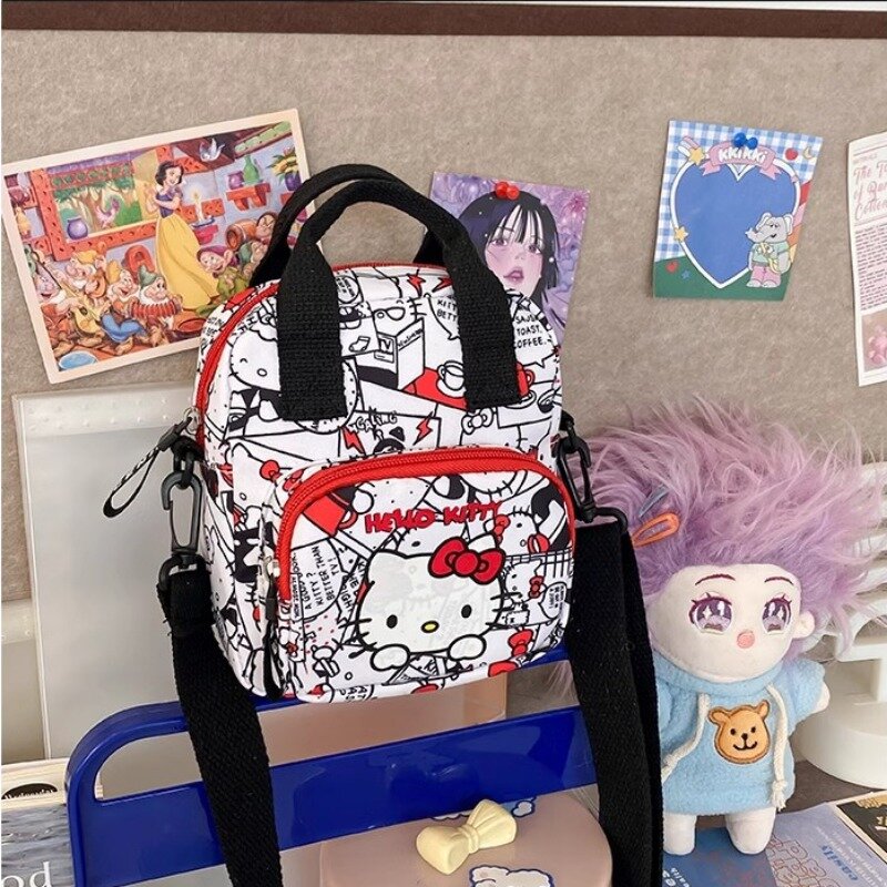 MBTI tas bahu Hello Kitty wanita, dompet koin wanita kasual imut nilon tas selempang motif kartun gaya Jepang kecil