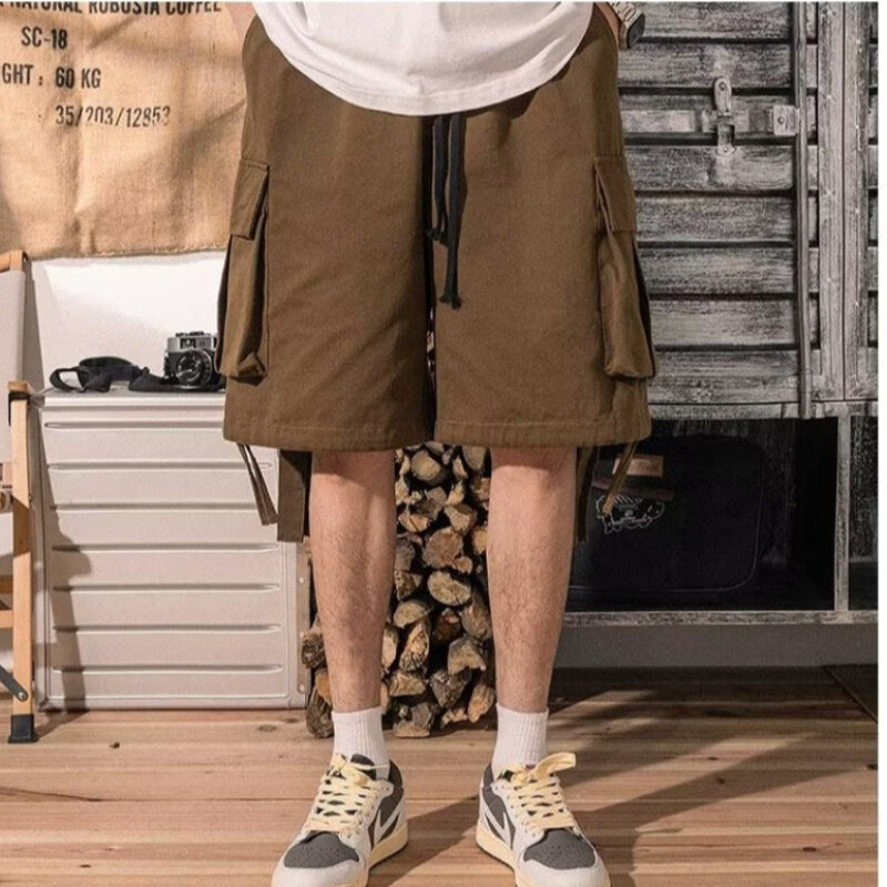 Celana pendek kargo pria kantong longgar Semua cocok gaya Jepang Chic Tinggi Jalan lutut panjang Harajuku mode musim panas kuliah sederhana baru