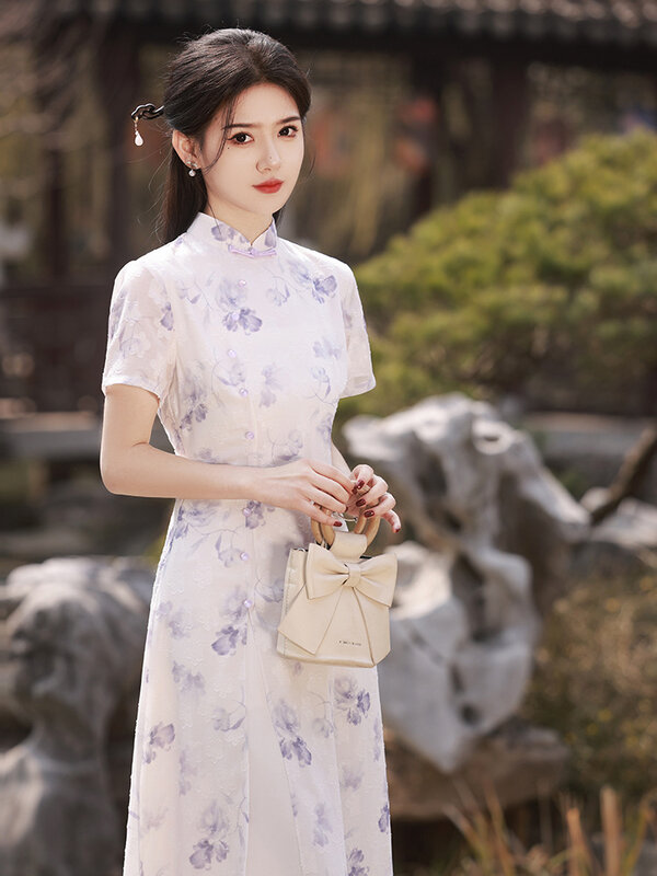 กี่เพ้าชุดโบราณแฟชั่นจีนสำหรับผู้หญิงชุดเดรสเด็กเพรียวบางภาพวินเทจชุดเดรสยาวสไตล์ประจำชาติใหม่