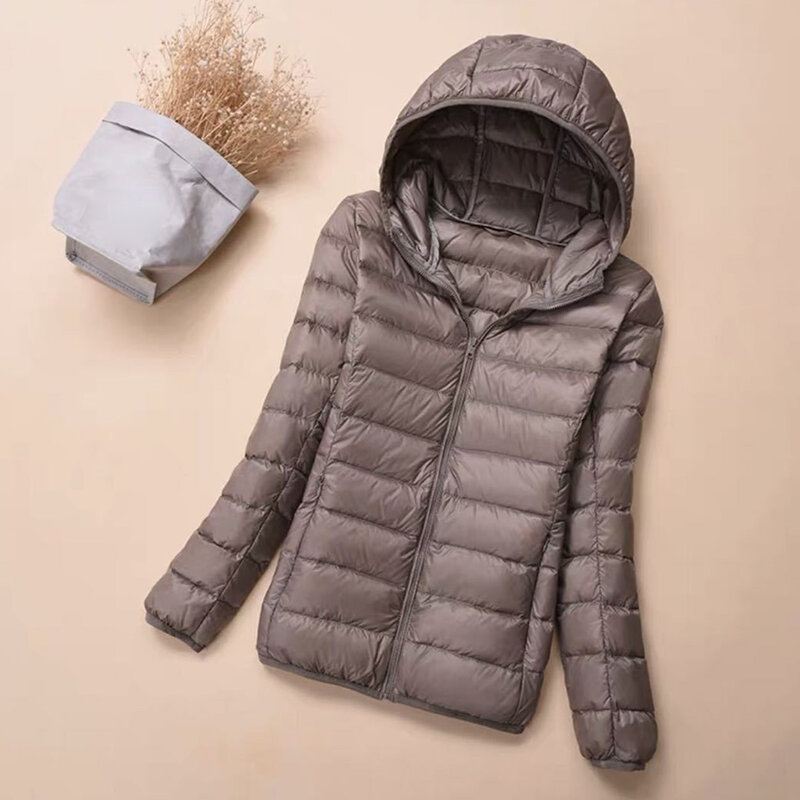Jaket wanita pendek ramping nyaman, mantel beritzip dengan saku untuk pemakaian luar ruangan musim dingin