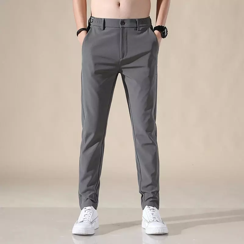 Wiosna lato nowa codzienne męskie spodnie męska cienkie spodnie Slim Fit praca elastyczna talia spodnie do joggingu męska Plus rozmiar 28-38