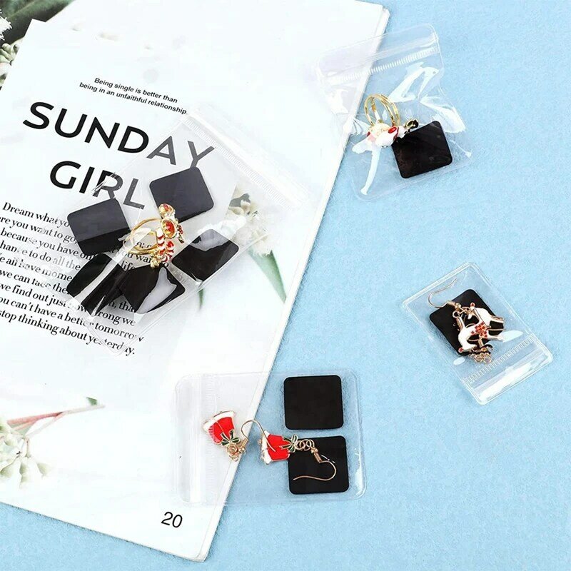 Set tas penutup ritsleting plastik perhiasan bening 120 buah, dengan strip Tab kertas anti-noda perhiasan kartu hadiah