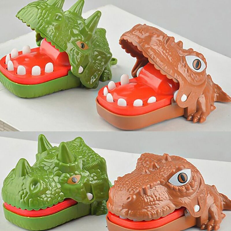 لعبة إصبع لدغة الديناصور الصغيرة ، مسكن الإجهاد البلاستيكي ، لعبة تخفيف الضغط ، هدية لعبة استخراج الأسنان ، لون عشوائي