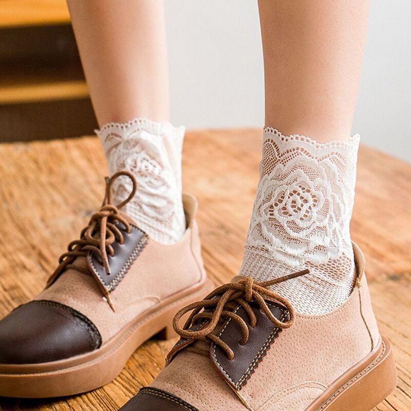 Moda presente slik lolita na moda meias femininas japonesas meias de renda oco para fora flor meio tubo meias