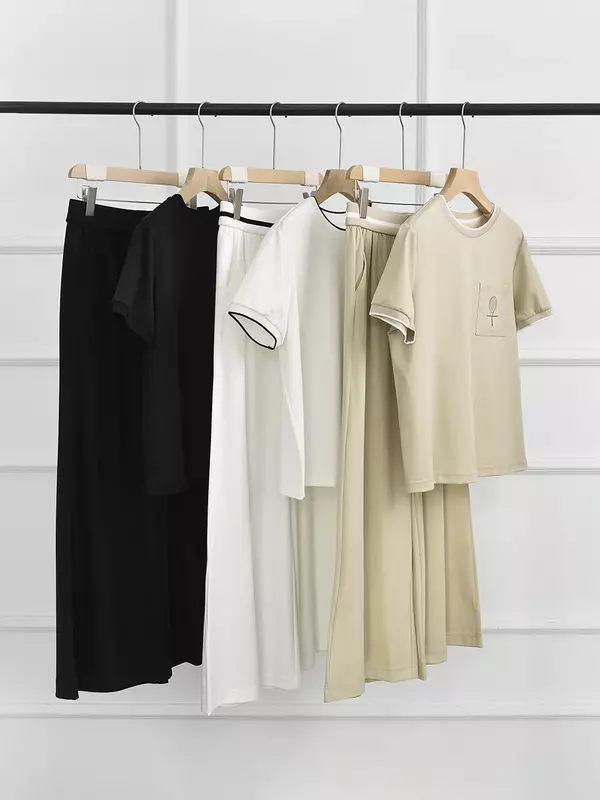 Camiseta de manga corta con cuello redondo y bolsillos bordados para mujer, conjunto de pantalones informales elásticos de cintura alta, Color liso, novedad de 2024