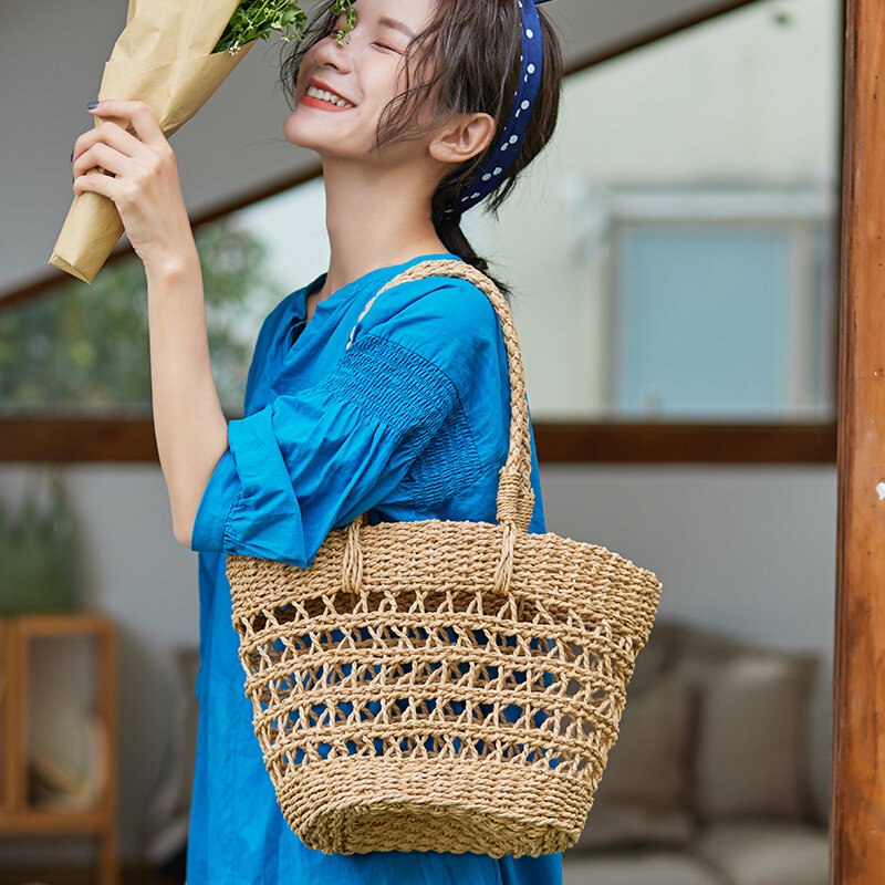 2024 musim panas Perancis Retro tas tenun musim panas mode kasual tas jinjing buatan tangan Jepang tas jerami berongga tas tangan wanita besar
