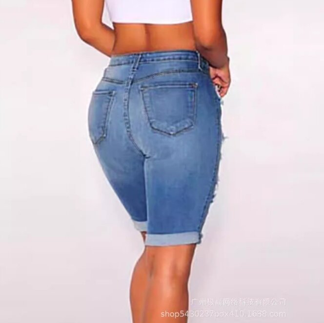 Neue Damen bekleidung 2024 vielseitige personal isierte perforierte Mittel hose trend ige Slim Fit elastische Jeans