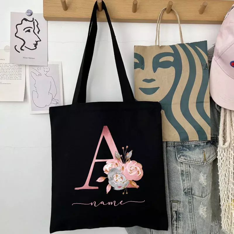 Bolso de lona personalizado con nombre para mujer, bolsa plegable de gran capacidad con flores rosas y letras, color negro, para ocio, compras, regalo, novedad