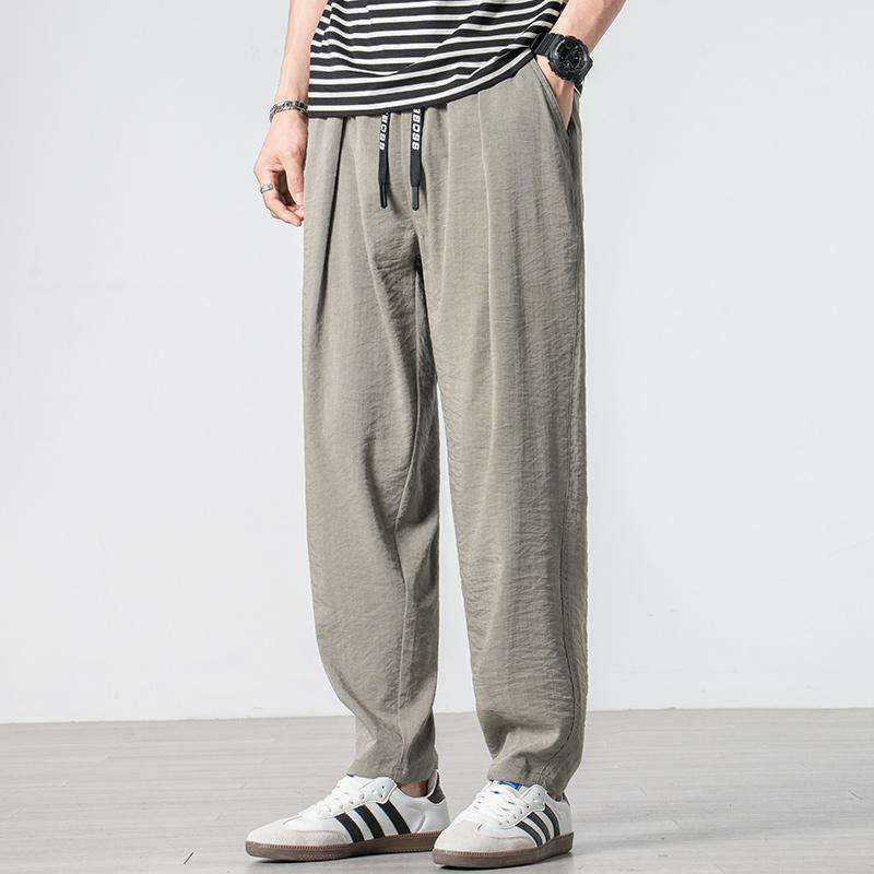 Letnie męskie spodnie 2024, nowe, patchworkowe, wysokiej talii, elastyczne kieszenie ze sznurkiem w jednolitym kolorze, wygodne i wszechstronne spodnie na co dzień