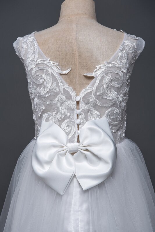 女の子のための白いチュールの長いウェディングドレス,大きな弓のアップリケ付きの素敵な花の形