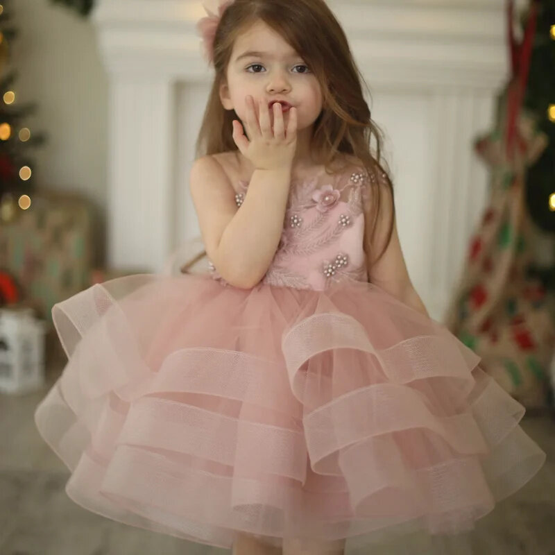 Perle rosa chiaro Tulle Flower Girl Dress Applique a strati senza maniche con fiocco per abito da festa di compleanno principessa adorabile
