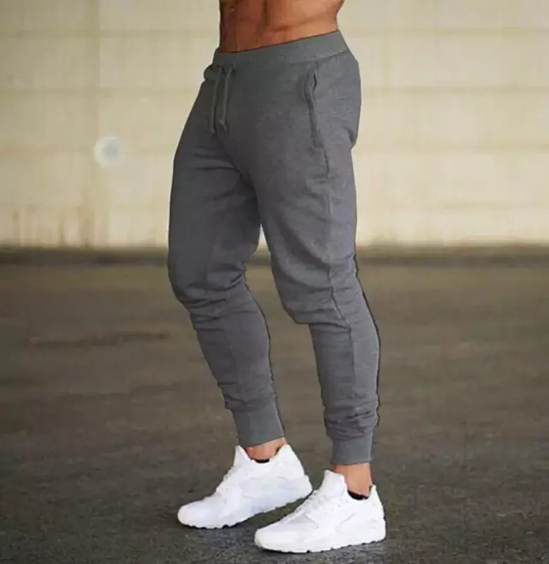 Pantalones de chándal ajustados de color puro para hombre, pantalón largo informal de entrenamiento, a la moda, para correr, 2024
