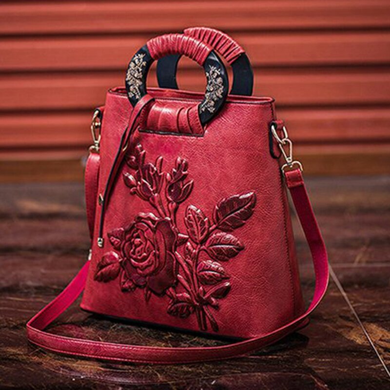 女性のための革のハンドバッグ,ヴィンテージスタイルのバケットバッグ,エンボス加工のプリント,レトロなデザイン,花柄のハンドバッグ,高級トートバッグ