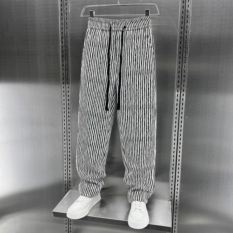 Celana panjang kasual longgar pria, celana panjang bergaris pinggang tinggi elastis serut musim panas gaya Amerika