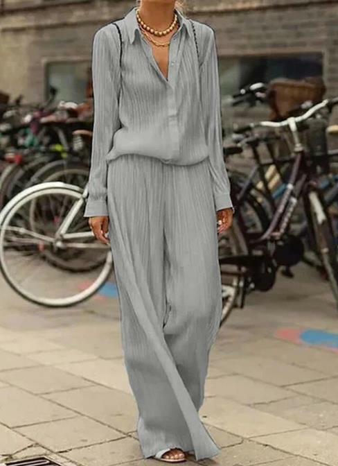 Nowa odzież damska 2023 na gorąco sprzedająca się w stylu Casual w jednolitym kolorze koszule z długim rękawem luźny zestaw w magazynie