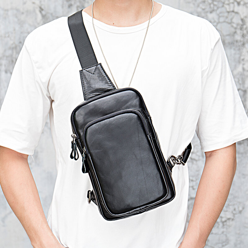 ファッショナブルな本革のメンズバッグ,携帯電話用の黒いチェストバッグ,カジュアルなスポーツショルダーバッグ,牛革100%