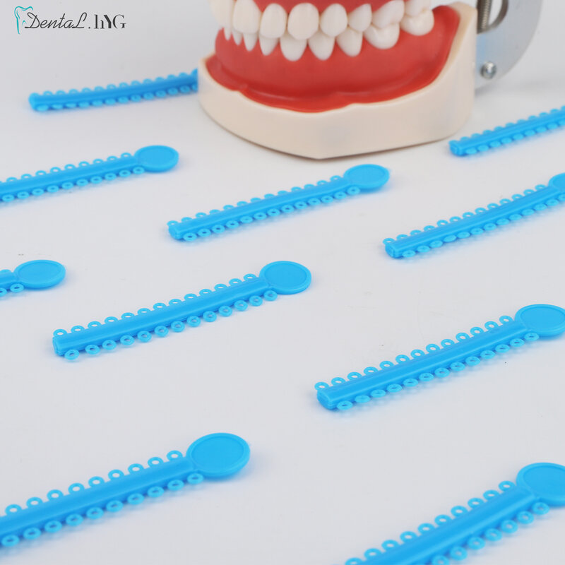 Bandas de ligadura elásticas para ortodoncia Dental, 1 paquete de 1040 piezas/40 palos, para soportes, coloridos a elegir