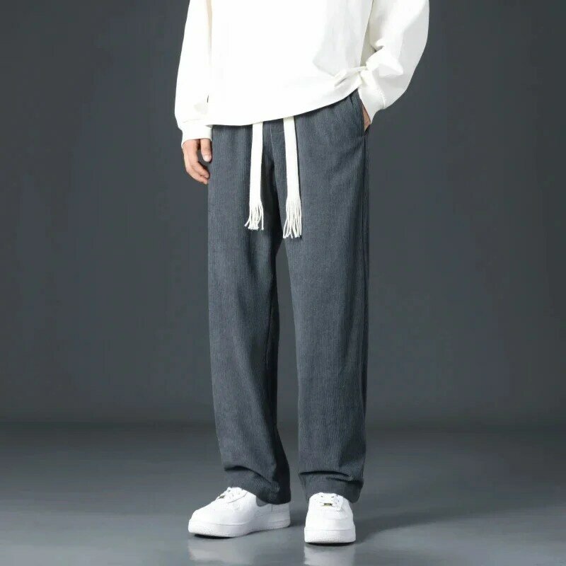 Jesienno-zimowe męskie spodnie spodnie sztruksowe szerokie Streetwear wysokiej jakości luźne spodnie do joggingu sznurek jednolity kolor