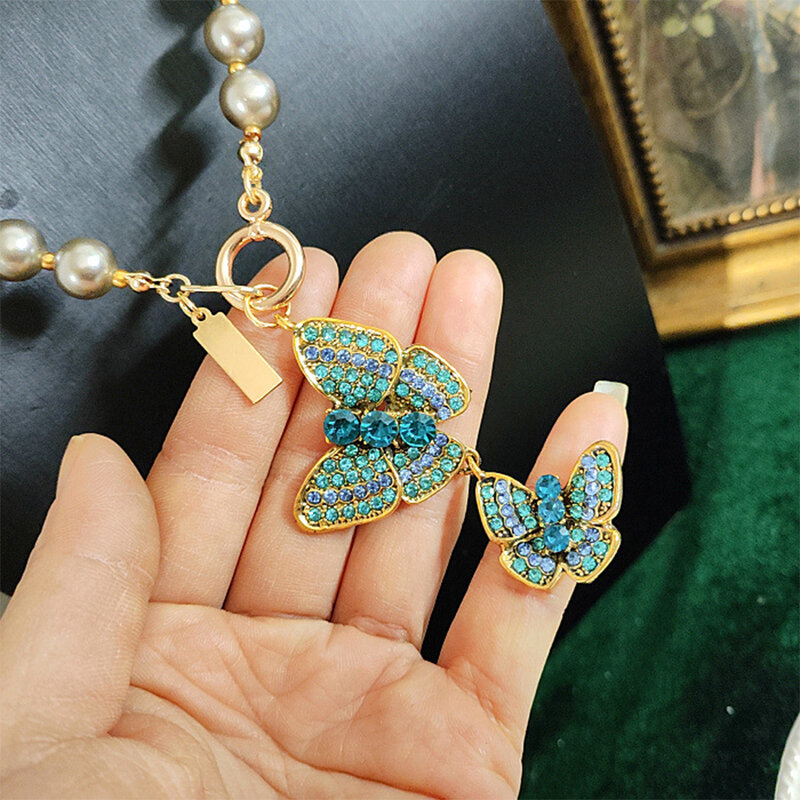 Collier avec pendentif papillon pour femme, perle de verre vintage, bijoux de tempérament, cadeau de fête pour fille, vente en gros