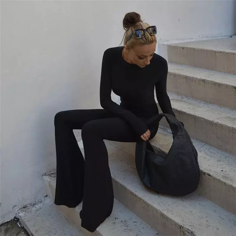 Tuta Casual semplice Streetwear estate Y2K Solid Black Basic body per le donne Sexy maniche lunghe Halter Backless Flare Pants