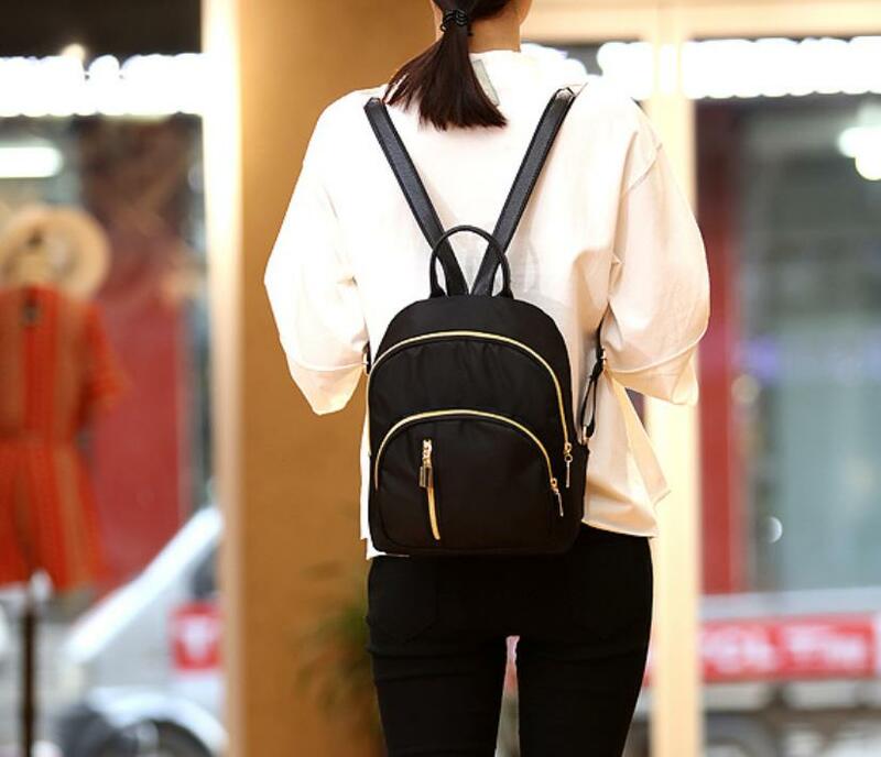 Mochila pequeña multifunción para mujer, bolso escolar bonito, mochila de hombro, color negro, a la moda, novedad