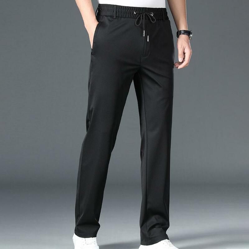 Luźny krój męskie spodnie rozciągliwy codzienne męskie spodnie z kieszeniami szybkoschnący prosty spodnie do fitnessu do wygodnego noszenia przez cały dzień