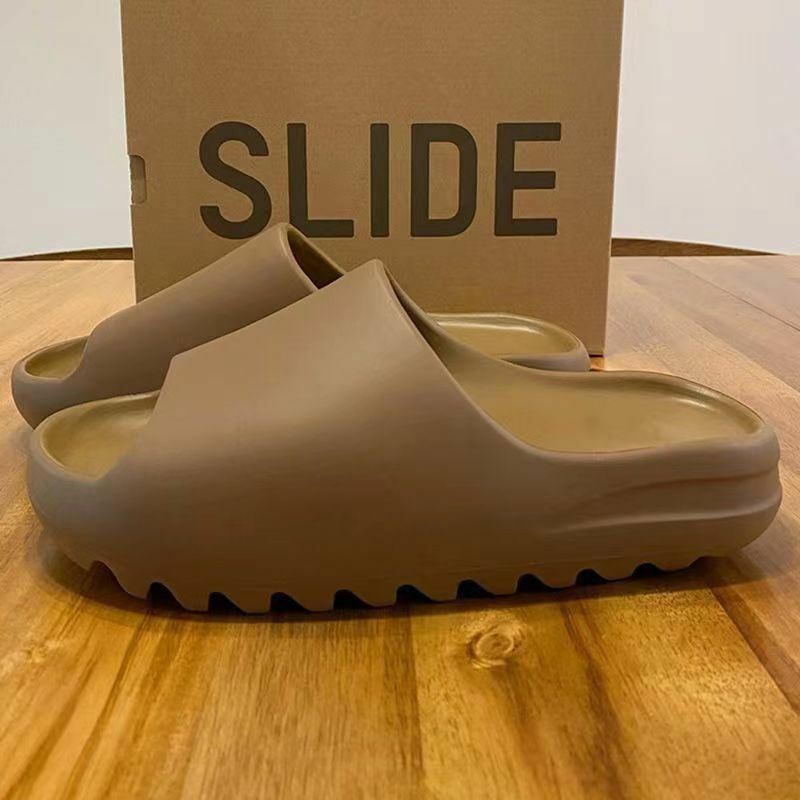 Pantofole da donna di marca da uomo moda EVA Slides 2023 estati sandali da spiaggia all'aperto scarpe Casual da donna sandali da uomo infradito da uomo