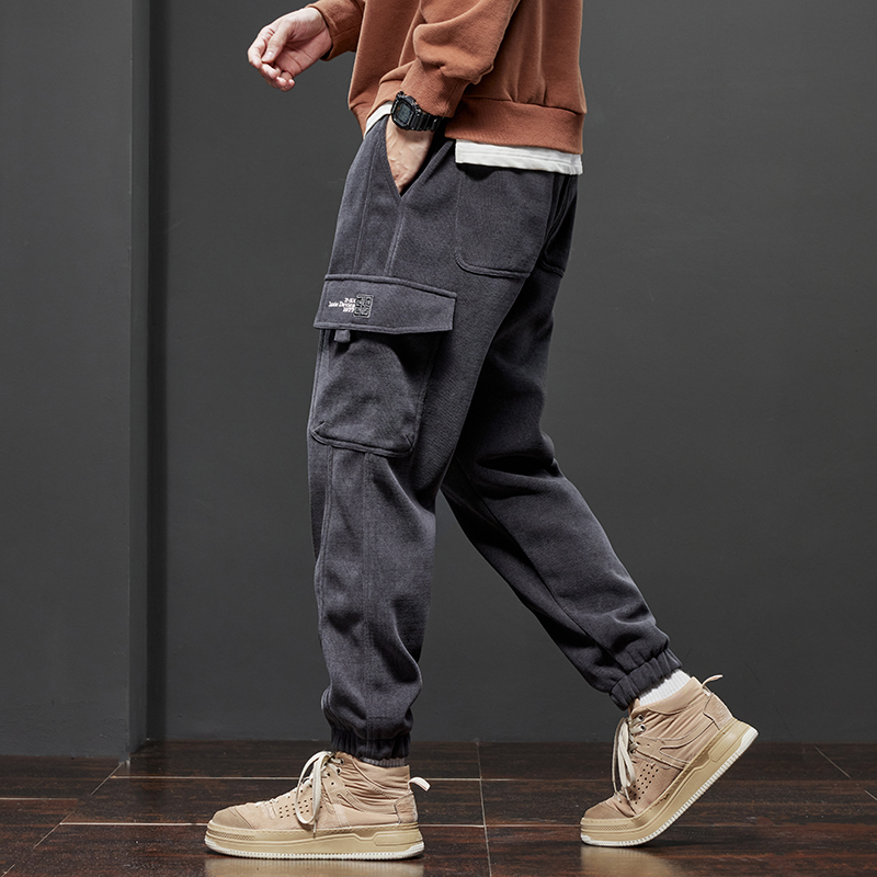 Pantaloni da Jogging in pile da uomo invernali pantaloni Cargo in velluto a coste spessi caldi moda pantaloni sportivi Harem Casual coreani Streetwear neri