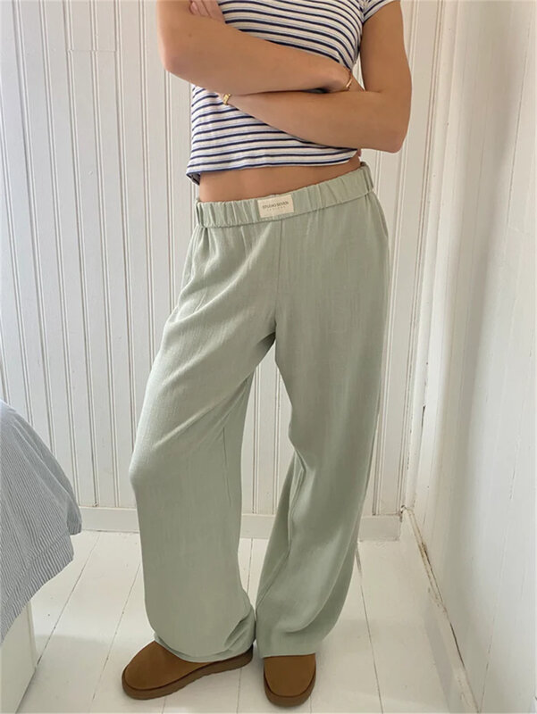 Y2k różowe spodnie codzienne prążki z nadrukiem elastyczne średnio wysoka talia spodnie z kieszeniami kobiet w stylu Vintage luźne, wygodne spodnie Streetwear