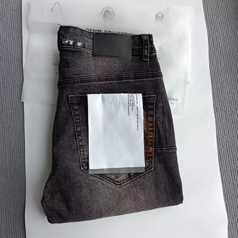 กางเกงยีนส์แบรนด์ Roca สีม่วงกางเกงยีนส์ฮิปฮอปซักป้ายย้อมสีดำซ่อมแซมต่ำทำให้กางเกงยีนส์ผอม