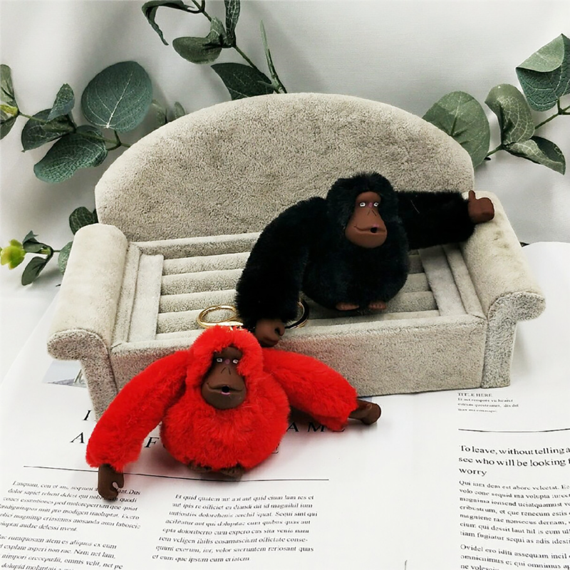 Simpatico peluche scimmia portachiavi Orangutan pantaloni borsa da donna accessori per auto giocattolo femminile Messenger Bag bambola peluche bambola portachiavi