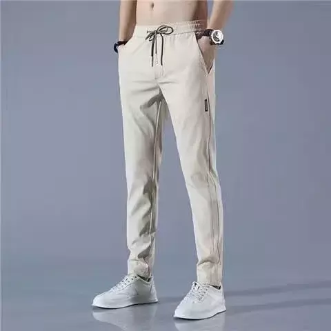 Solidny kolor spodnie męskie spodnie na co dzień spodnie ołówkowe z elastyczną talią oddychające spodnie biegaczy męskie spodnie bojówki Streetwear
