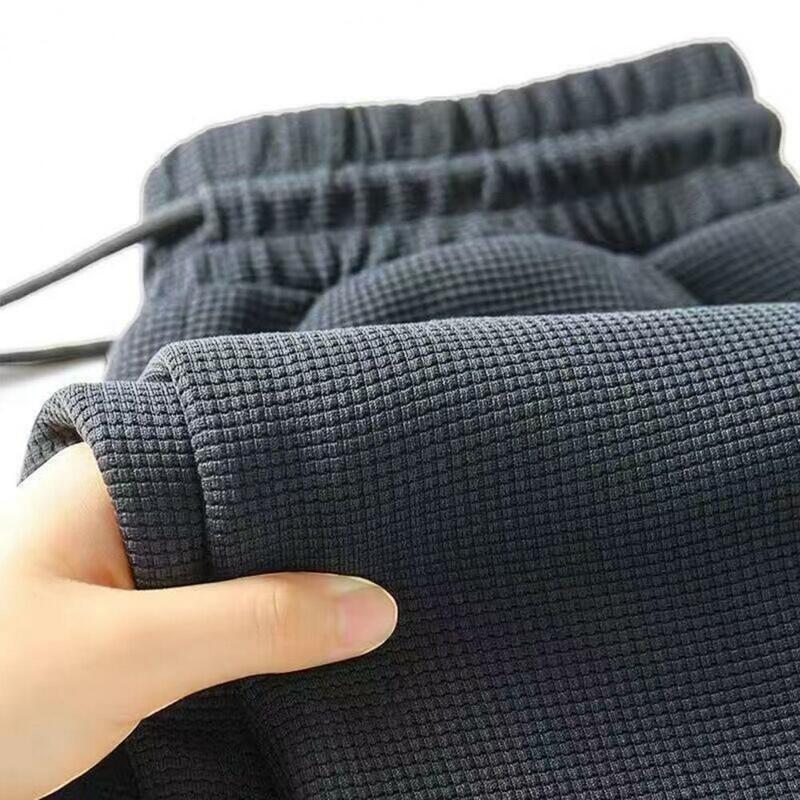 Мужские свободные брюки с эластичным поясом и карманами
