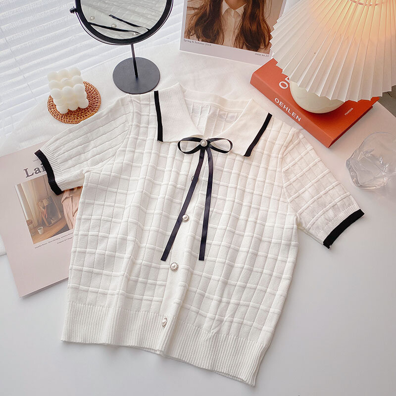 Desain gesper busur dan mutiara dengan Sweater rajut Retro untuk wanita awal musim gugur 2024 gaya Korea pola cek atasan pendek