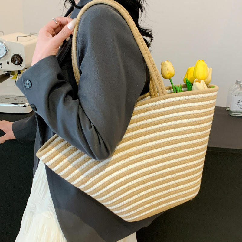 Fashionable Stripe Handheld Grass Woven Bag for Women with Large Capacity New Versatile Shoulder Bag for Beach Vacation Tote Bag