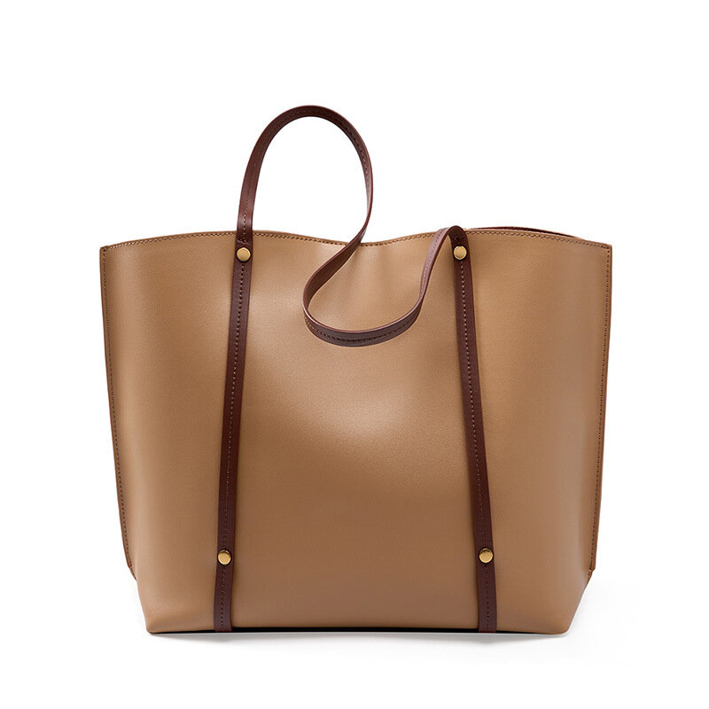 Una borsa tote minimalista in morbida pelle di nicchia, una borsa A tracolla di fascia alta per il pendolarismo casual di grande capacità