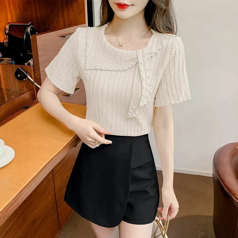 Süßer O-Ausschnitt gespleißt einfarbig schnüren Perlen T-Shirts Frauen Kleidung Sommer neue lose lässige Tops koreanische T-Shirt