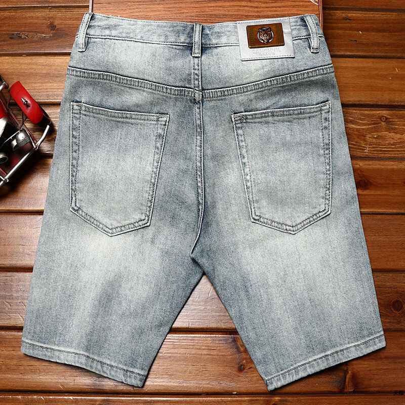 กางเกงขาสั้นขี่มอเตอร์ไซค์แนวสตรีทเทรนด์เกาหลีแฟชั่นผ้ายืดแบบปะติดสำหรับผู้ชาย celana pendek DENIM แบบย้อนยุคสำหรับฤดูร้อน