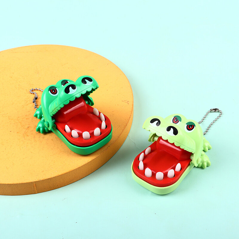 Creativo piccolo coccodrillo bocca dentista morso dito gioco gag giocattolo con portachiavi Tricky