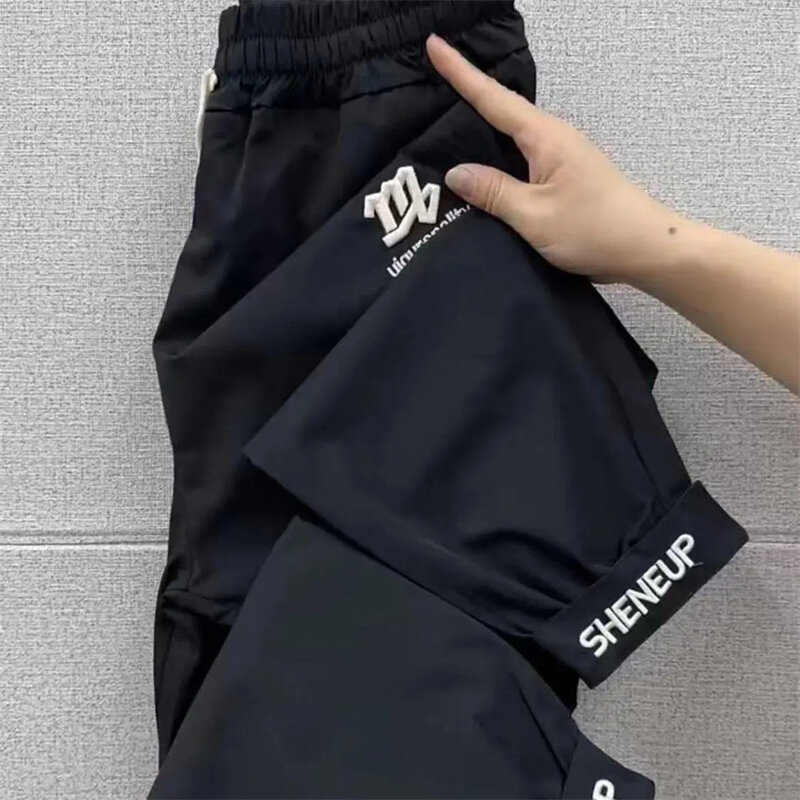 แฟชั่นใหม่2024กางเกงฮาเร็มผู้หญิงกางเกงกีฬาปักลายแห้งเร็วกางเกงผูกเอวยางยืดกางเกงลำลองของผู้หญิง
