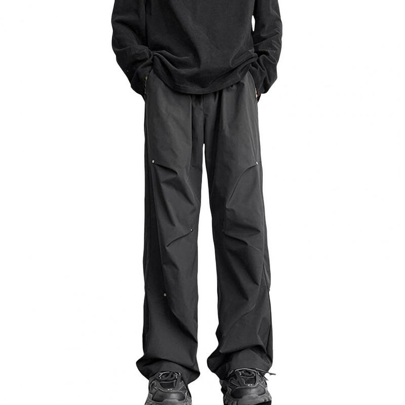 Pantalones de chándal de pierna recta para hombre, pantalones Cargo Unisex elegantes con decoración de remaches, ajuste suelto ancho, diseño impermeable para ropa de calle