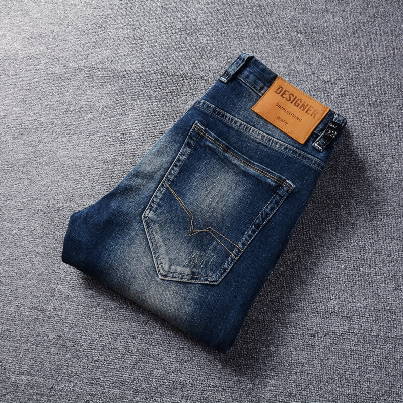Modne jeansy męskie w stylu Vintage Retro ciemnoniebieskie elastyczne elastyczne dopasowane porwane jeansy męskie designerskie hafty casualowe spodnie jeansowe Homme