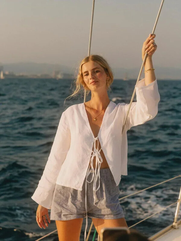 Solide Schnür schleife Frauen aushöhlen V-Ausschnitt Tops Strand Sonnenschutz Baumwolle Leinen hemd lässig ausgestellte Langarm bluse