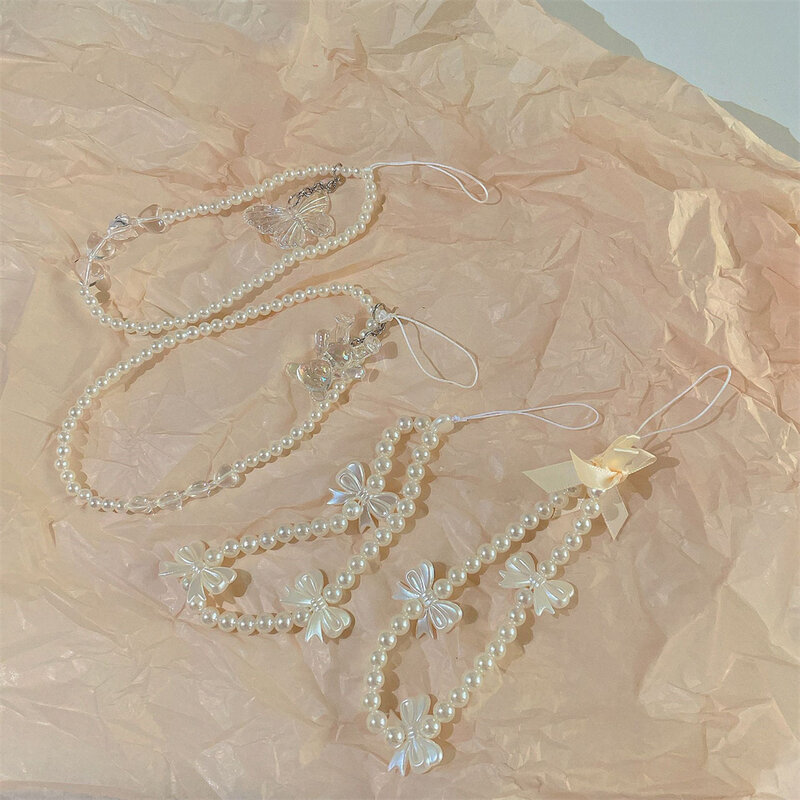 Bracelet perlé avec nœud en perles pour téléphone portable, breloque fleur et papillon, dragonne en acrylique, équipement anti-perte