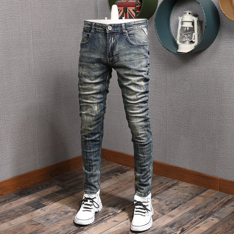 Streetwear moda uomo Jeans Retro blu elastico Slim Fit Jeans strappati Vintage uomo stampato Designer pantaloni Hip-Hop in Denim Hombre